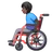 Man In Manual Wheelchair: Dark Skin Tone