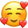 Lächelndes Gesicht mit lächelnden Augen und drei Herzen Emoji 🥰 image - Apple style