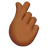 Hand With Index Finger And Thumb Crossed: Medium-Dark Skin Tone