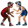 Men Wrestling: Medium-Dark Skin Tone, Light Skin Tone Emoji 👨🏾‍🫯‍👨🏻 image - Apple style
