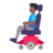 Man In Motorized Wheelchair: Medium-Dark Skin Tone