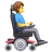 Man In Motorized Wheelchair Facing Right