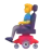 Man In Motorized Wheelchair
