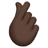 Hand With Index Finger And Thumb Crossed: Dark Skin Tone Emoji 🫰🏿 image - Apple style