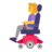 Woman In Motorized Wheelchair