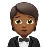 Person In Tuxedo: Medium-Dark Skin Tone Emoji 🤵🏾 image - Apple style