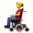 Man In Motorized Wheelchair
