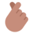 Hand With Index Finger And Thumb Crossed: Medium Skin Tone