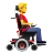 Man In Motorized Wheelchair Facing Right