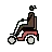 Woman In Motorized Wheelchair: Dark Skin Tone