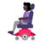 Woman In Motorized Wheelchair: Dark Skin Tone