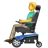Man In Motorized Wheelchair