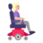 Woman In Motorized Wheelchair Facing Right: Medium-Light Skin Tone