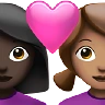 Couple With Heart: Woman, Woman, Dark Skin Tone, Medium Skin Tone Emoji 👩🏿‍❤️‍👩🏽 image - Apple style