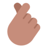 Hand With Index Finger And Thumb Crossed: Medium Skin Tone Emoji 🫰🏽 image - Microsoft Classic 2D style