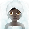 Woman In Steamy Room: Dark Skin Tone Emoji 🧖🏿‍♀️ image - Apple style