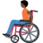 Person In Manual Wheelchair: Dark Skin Tone
