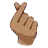 Hand With Index Finger And Thumb Crossed: Medium Skin Tone