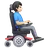 Man In Motorized Wheelchair Facing Right: Light Skin Tone