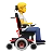 Person In Motorized Wheelchair Facing Right